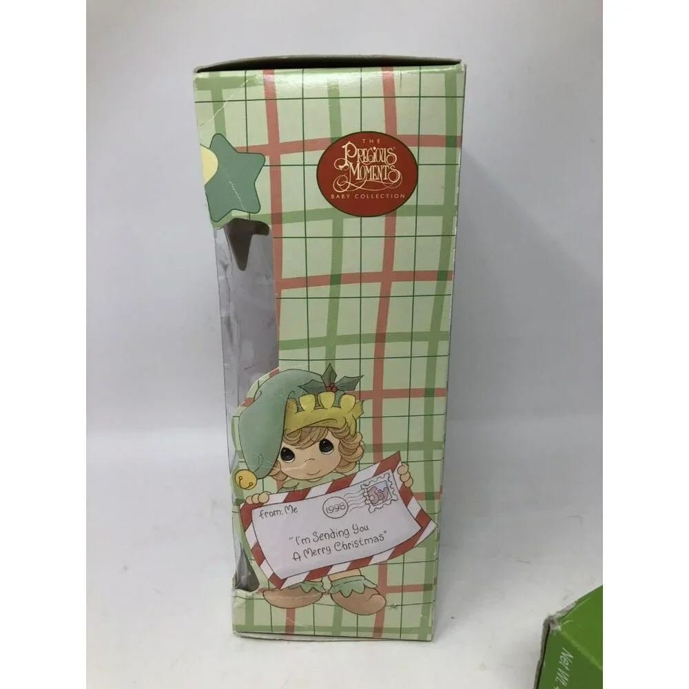New 2000 The Precious Moments Baby Collection Santa Clause Luv n' Care